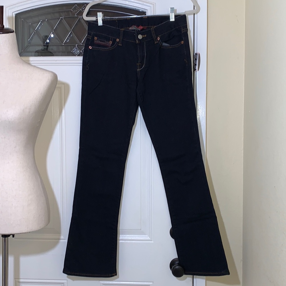 Lucky brand dark blue jeans in good used condition.